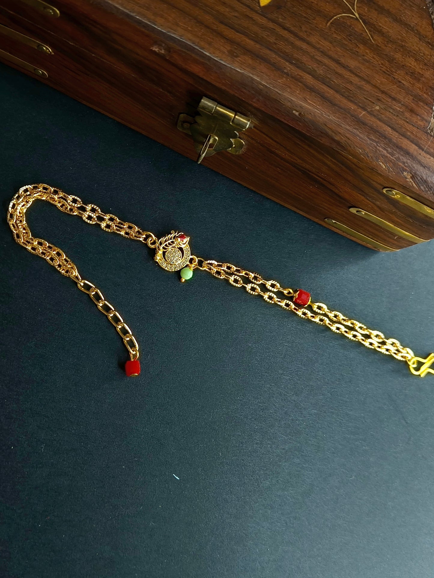 AD FEATHER BRACELET BHABHI RAKHI