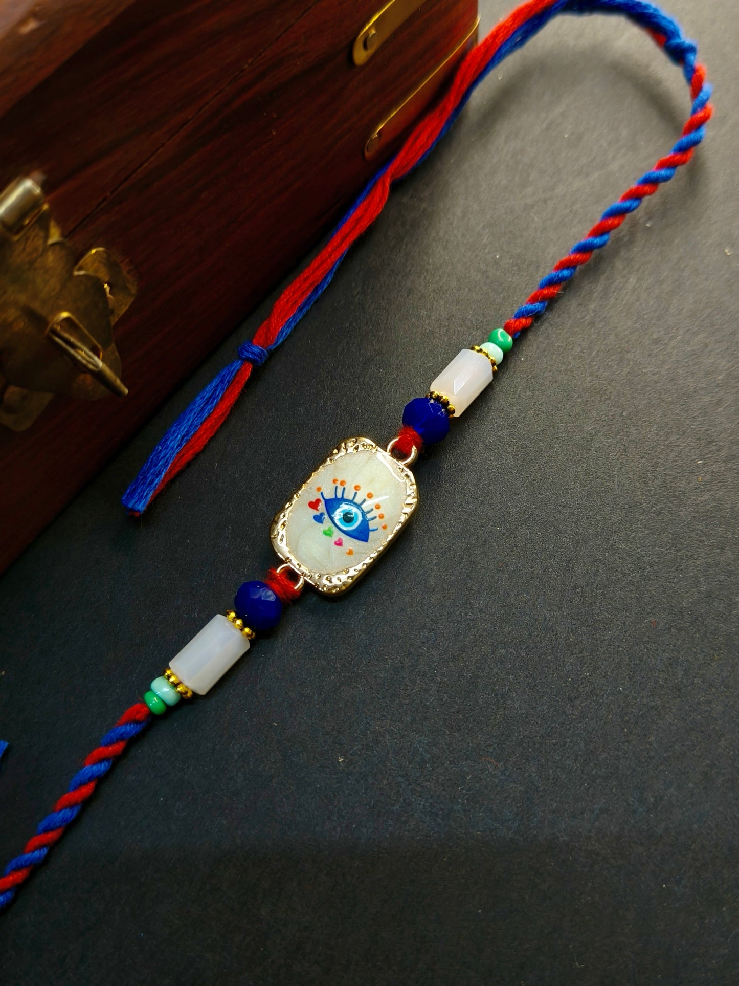 EVIL EYE MOTHER OF PERAL BHAI RAKHI