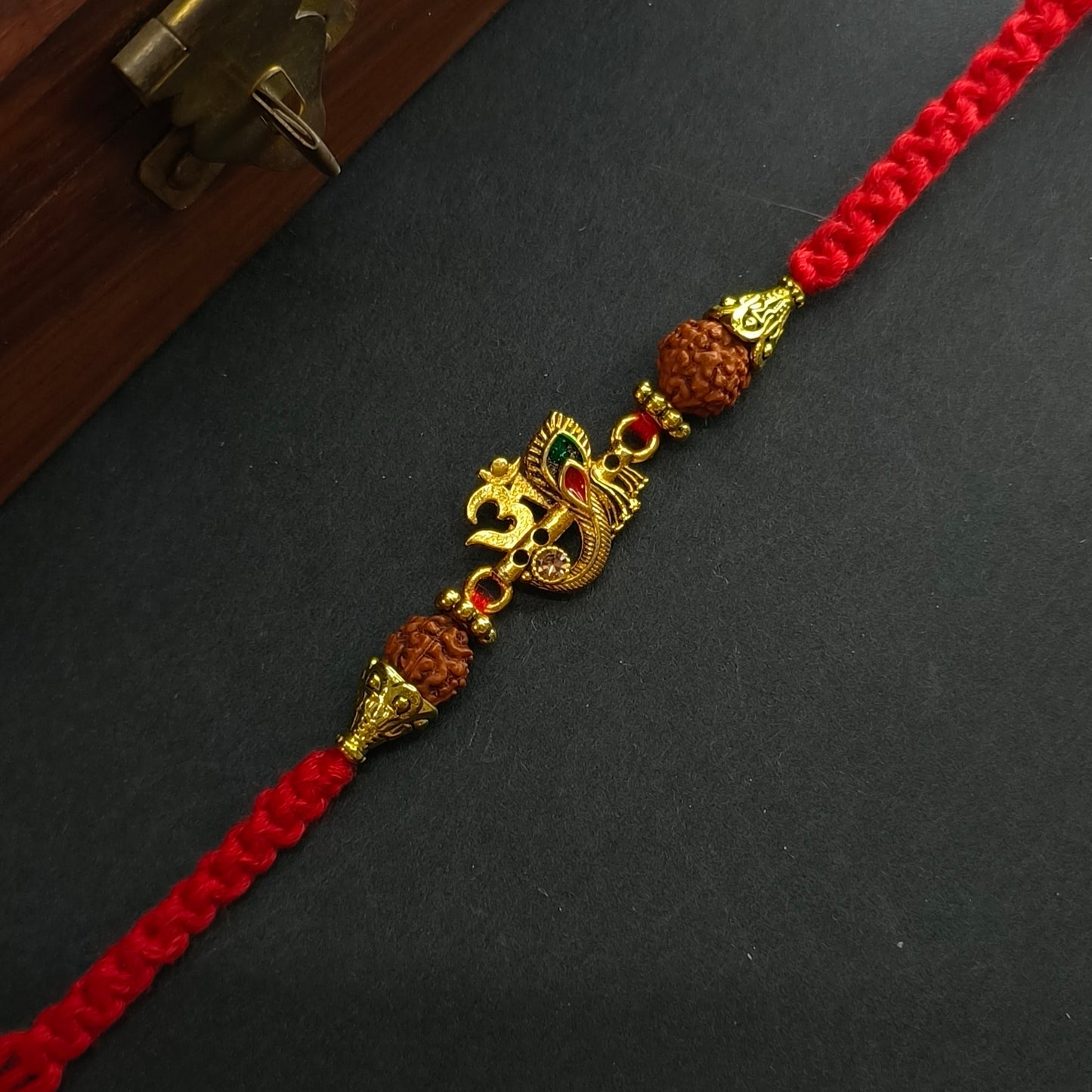 OM FLUTE FEATHER BHAI RAKHI