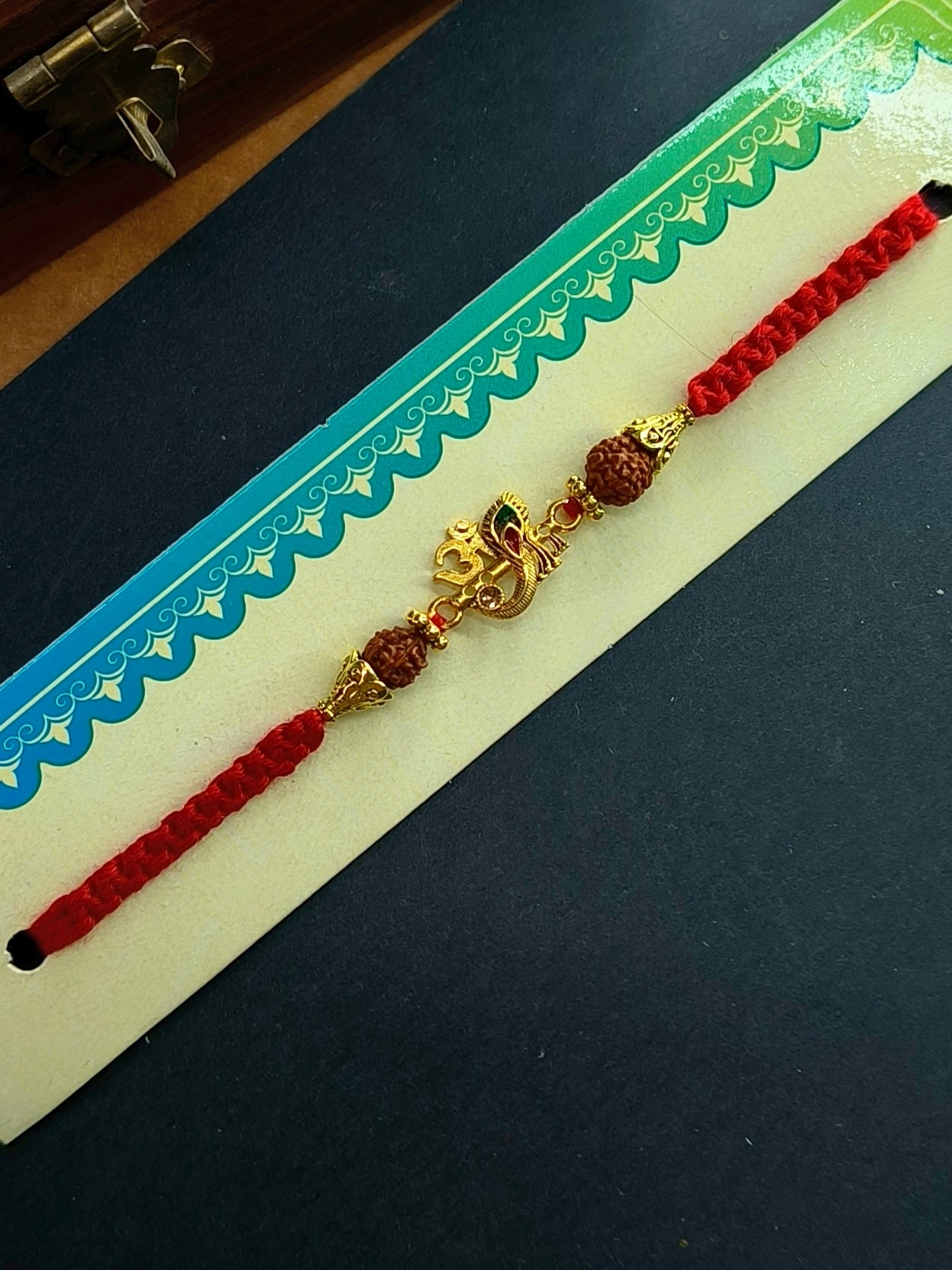 OM FLUTE FEATHER BHAI RAKHI