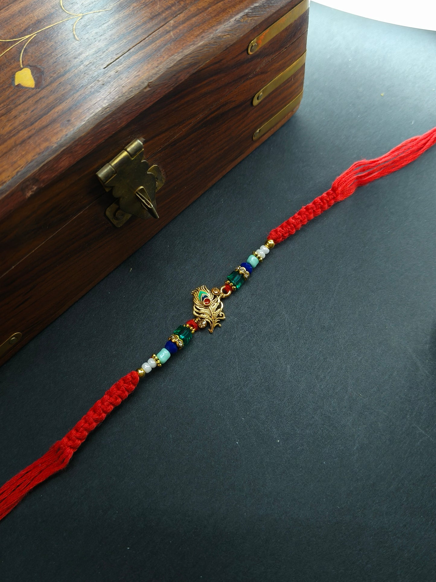 FEATHER BEDED BHAI RAKHI